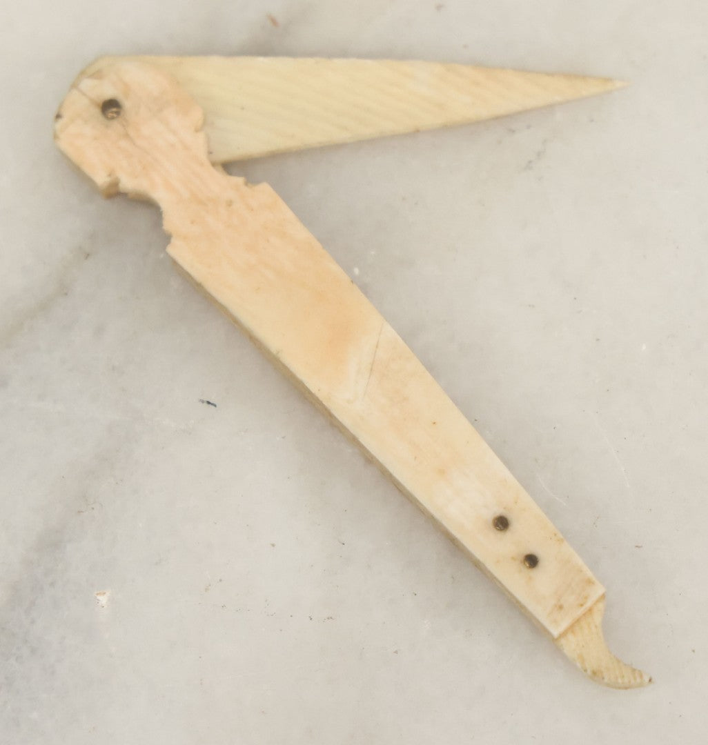 Lot 049 - Antique Carved Scrimshaw Bone Folding Knife, Primitive Handcrafted Design