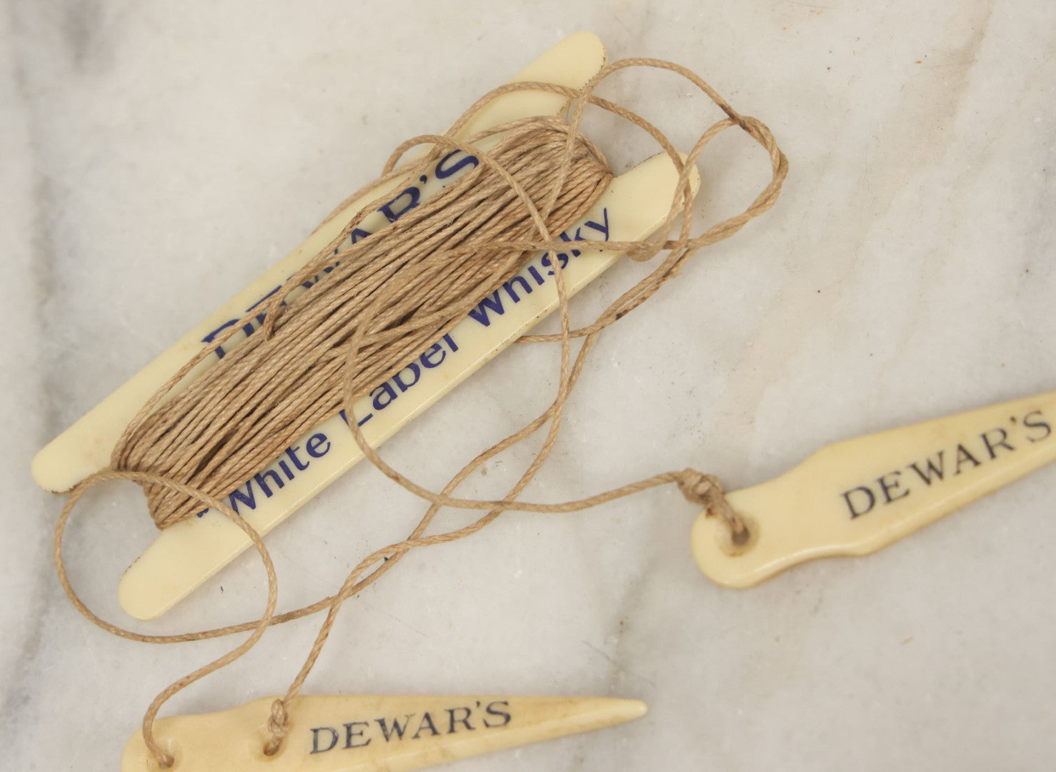 Lot 052 - Vintage Dewar’s White Label Whisky String Holder With Bone Tags, Advertising Collectible