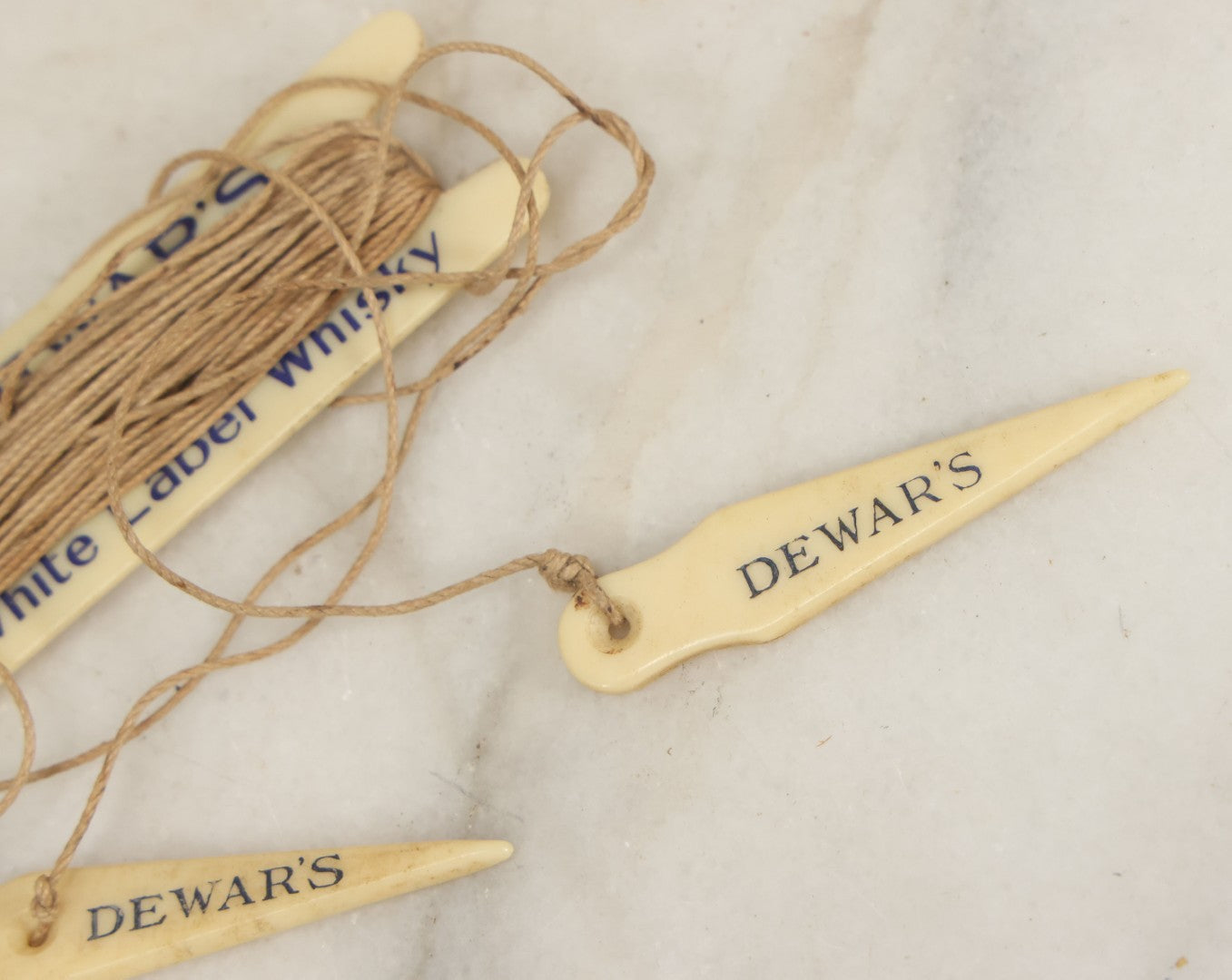 Lot 052 - Vintage Dewar’s White Label Whisky String Holder With Bone Tags, Advertising Collectible