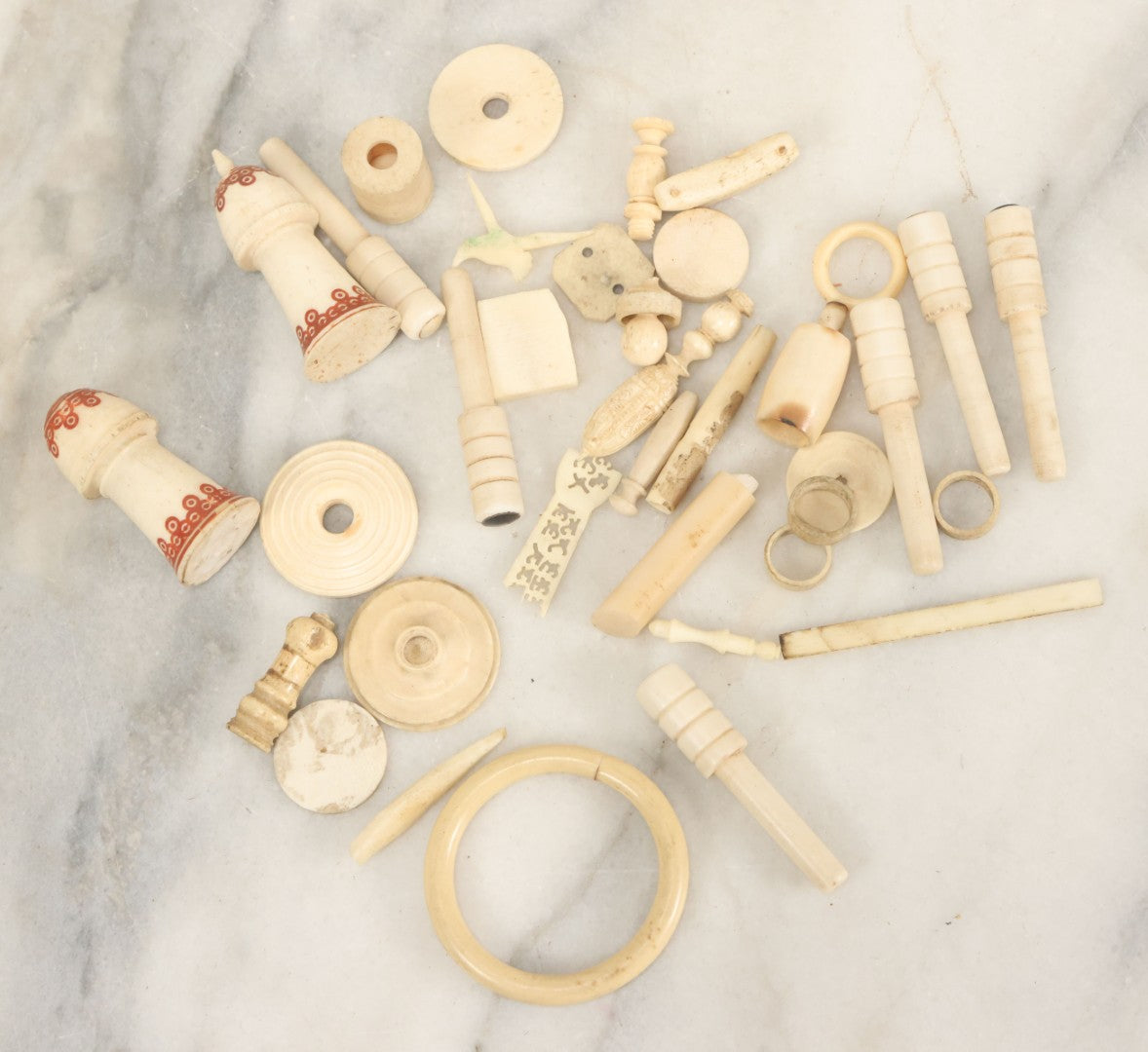 Lot 059 - Grouping Of Antique And Vintage Bone Fragments, Chess Pieces, Rings, Spindles, And Miscellaneous Items, 20+ Pieces
