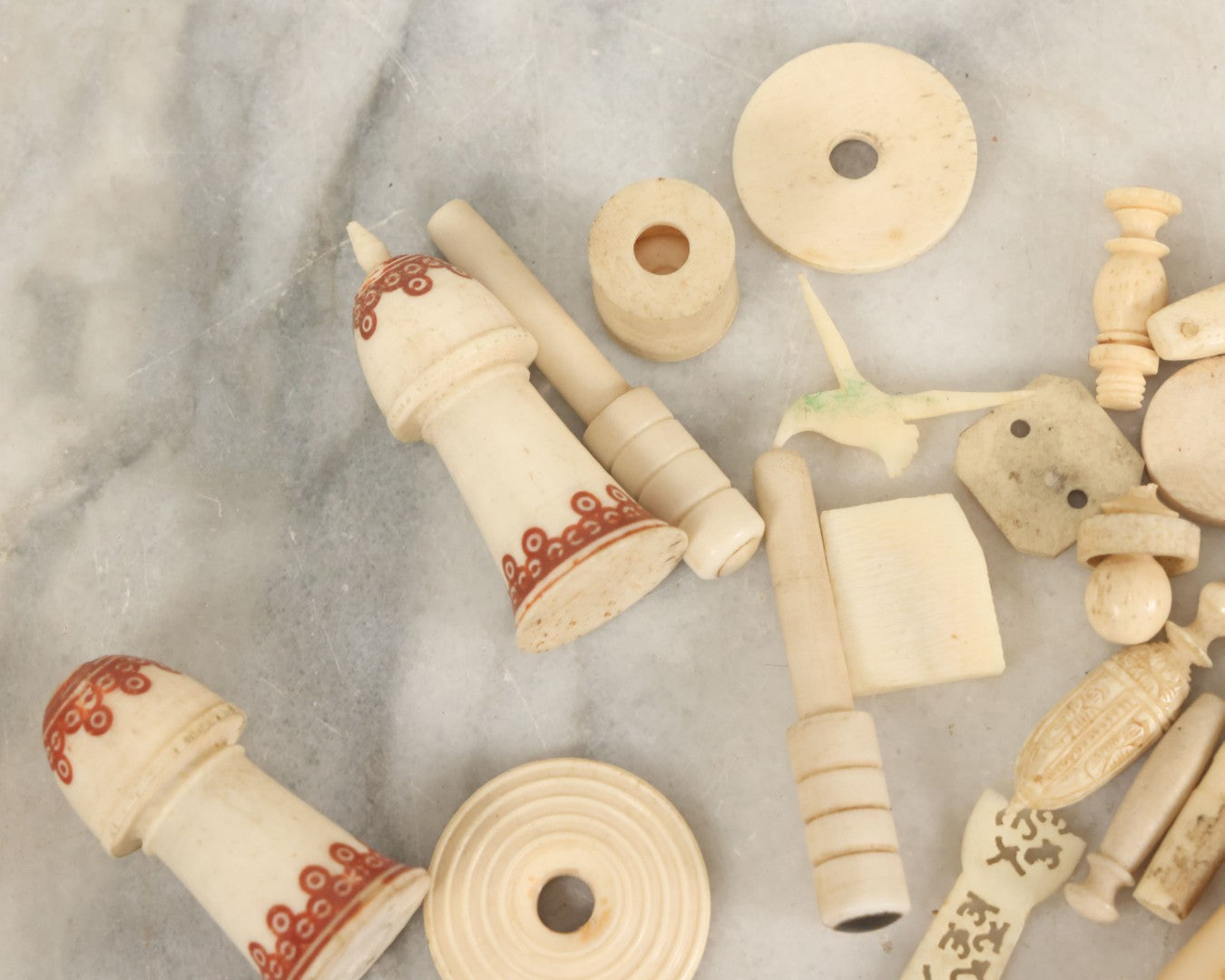 Lot 059 - Grouping Of Antique And Vintage Bone Fragments, Chess Pieces, Rings, Spindles, And Miscellaneous Items, 20+ Pieces