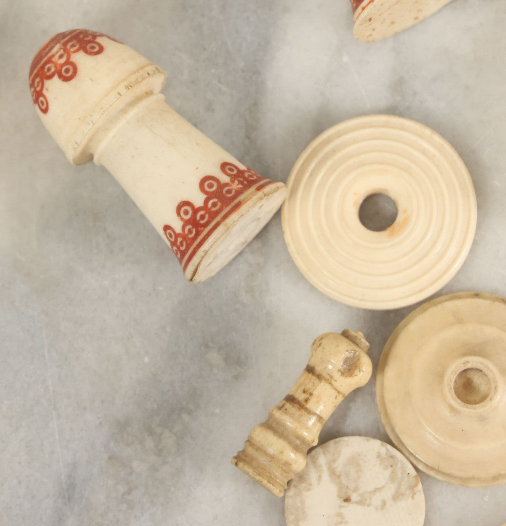 Lot 059 - Grouping Of Antique And Vintage Bone Fragments, Chess Pieces, Rings, Spindles, And Miscellaneous Items, 20+ Pieces