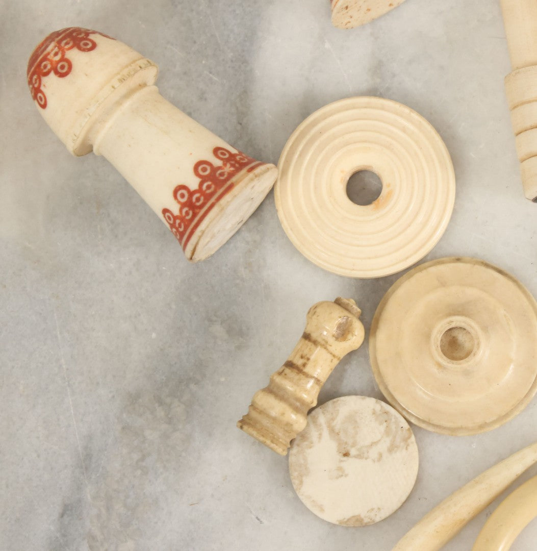 Lot 059 - Grouping Of Antique And Vintage Bone Fragments, Chess Pieces, Rings, Spindles, And Miscellaneous Items, 20+ Pieces