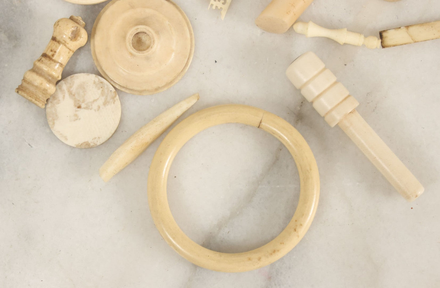 Lot 059 - Grouping Of Antique And Vintage Bone Fragments, Chess Pieces, Rings, Spindles, And Miscellaneous Items, 20+ Pieces