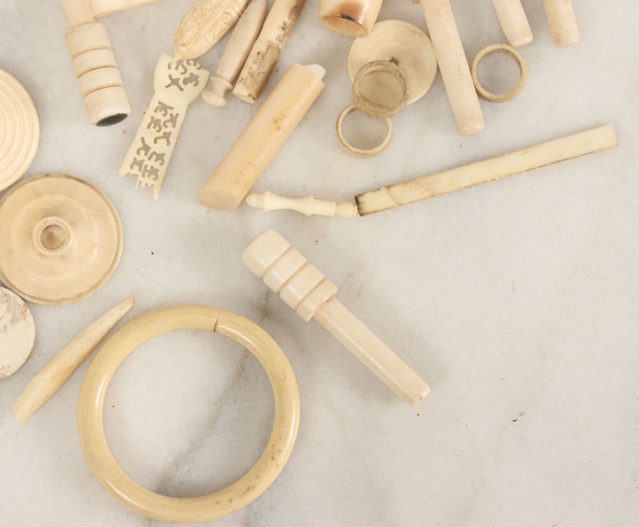 Lot 059 - Grouping Of Antique And Vintage Bone Fragments, Chess Pieces, Rings, Spindles, And Miscellaneous Items, 20+ Pieces
