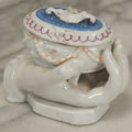 Lot 066 - Antique Porcelain Hand Holding Lidded Trinket Box, Ornate Decorative Design, Note Finial Broken Off, Included