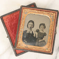 Lot 082 - Antique 1/6th Plate Tintype Photograph Of A Mother And Her Curly Haired Daughter, In Full Split Leatherette Union Case