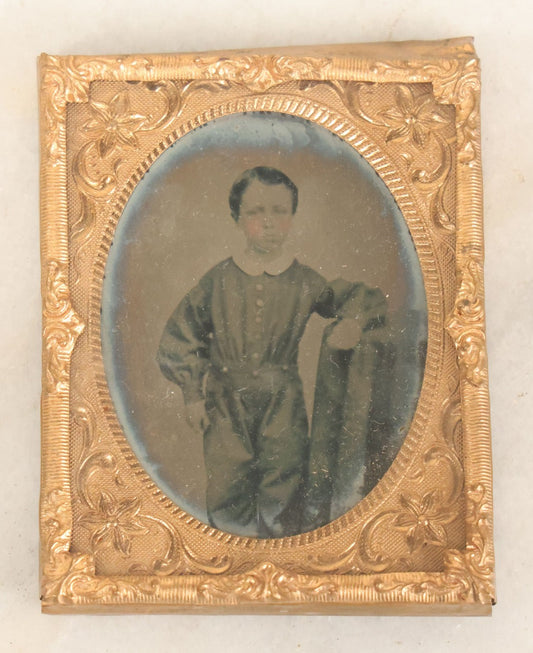 Lot 084 - Antique 1/9th Plate Ruby Ambrotype Photograph Of A Little Boy In A One Piece Suit, Leaning On Table