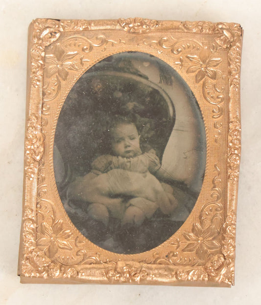 Lot 085 - Antique 1/9th Plate Ruby Ambrotype Photograph Of A Slouching Baby In A Chair