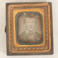 Lot 087 - Antique 1/16th Plate Daguerreotype Of A Young Man In A Bowtie In A Half Leatherette Case