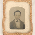 Lot 090 - Antique 1/9th Plate Tintype Photograph Of A Young Boy In A Jacket With A Bowtie, White Paper Mat
