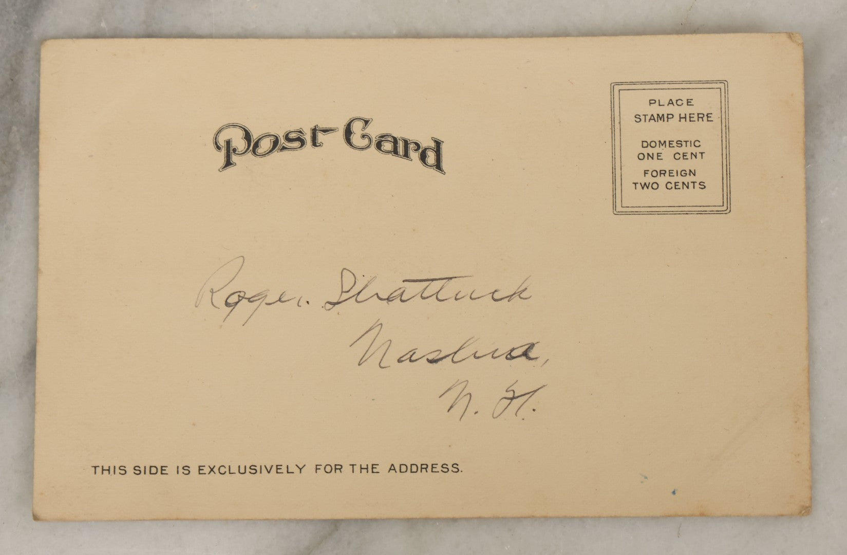 Lot 107 - Single Antique Postcard, "The Morning After" With Skull Smoking A Cigarette, Bottle Of Alcohol, Copyright 1905 By Blaesi & Bell, After A.M.C. Bell, 1904