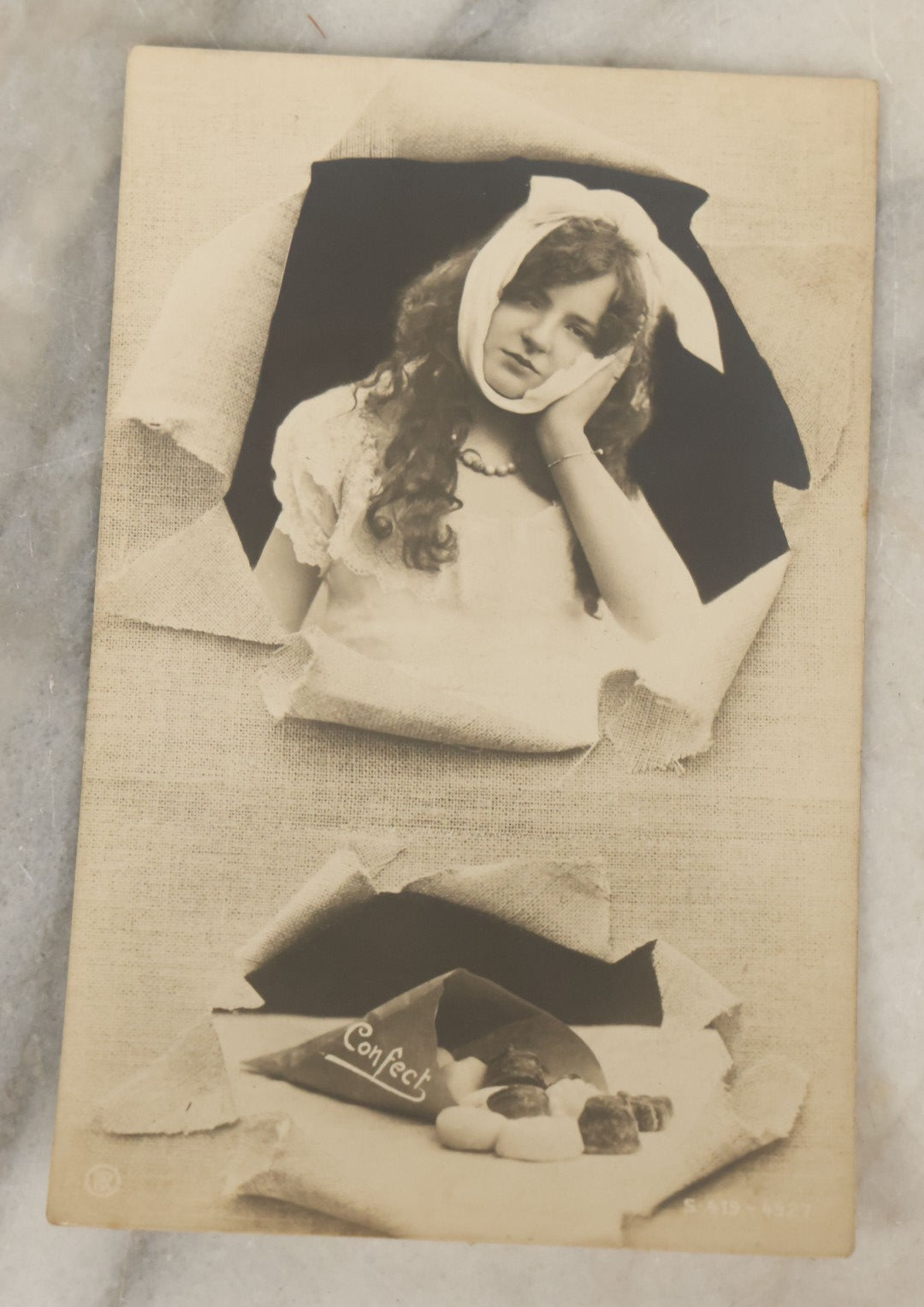 Lot 113 - Grouping Of Four Antique Postcards Including "You're A Peach," Girl With Toothache, Lemons, And Black Pug Dog, Early 20th Century