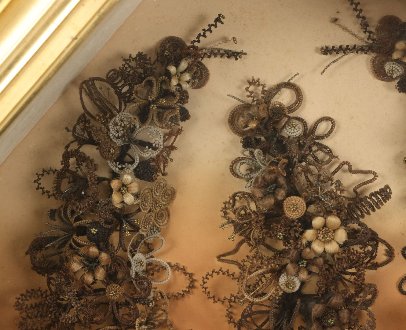 Lot 001 - Antique Victorian Human Hair Work Wreath In Octagon Shadow Box With Paper Label From J.D. Powers' Photograph Rooms, Springfield, Vermont, 20" x 20" x 6"