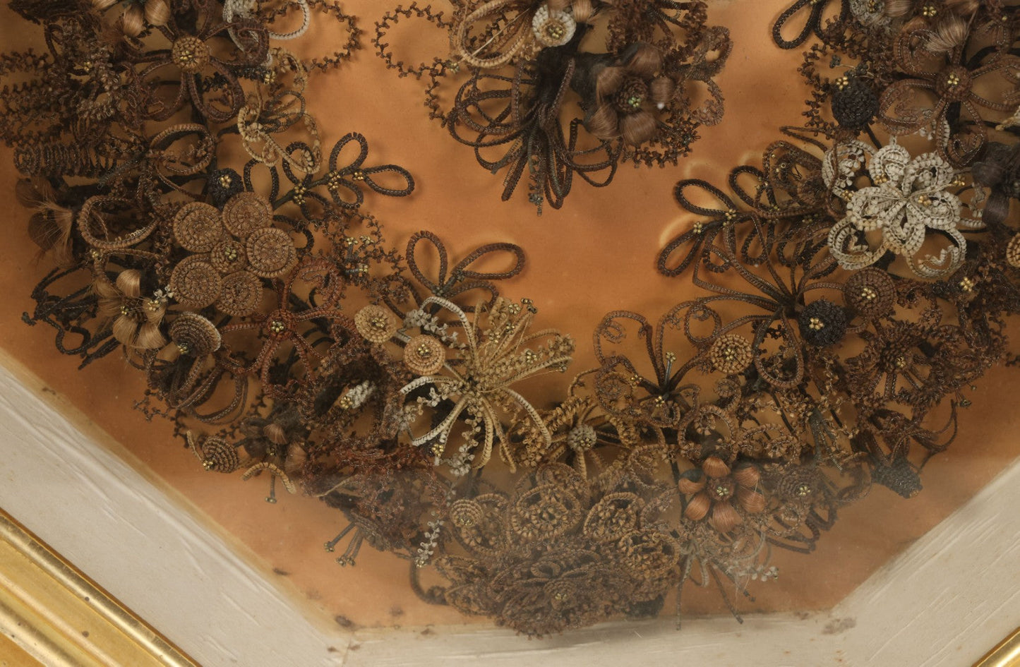 Lot 001 - Antique Victorian Human Hair Work Wreath In Octagon Shadow Box With Paper Label From J.D. Powers' Photograph Rooms, Springfield, Vermont, 20" x 20" x 6"