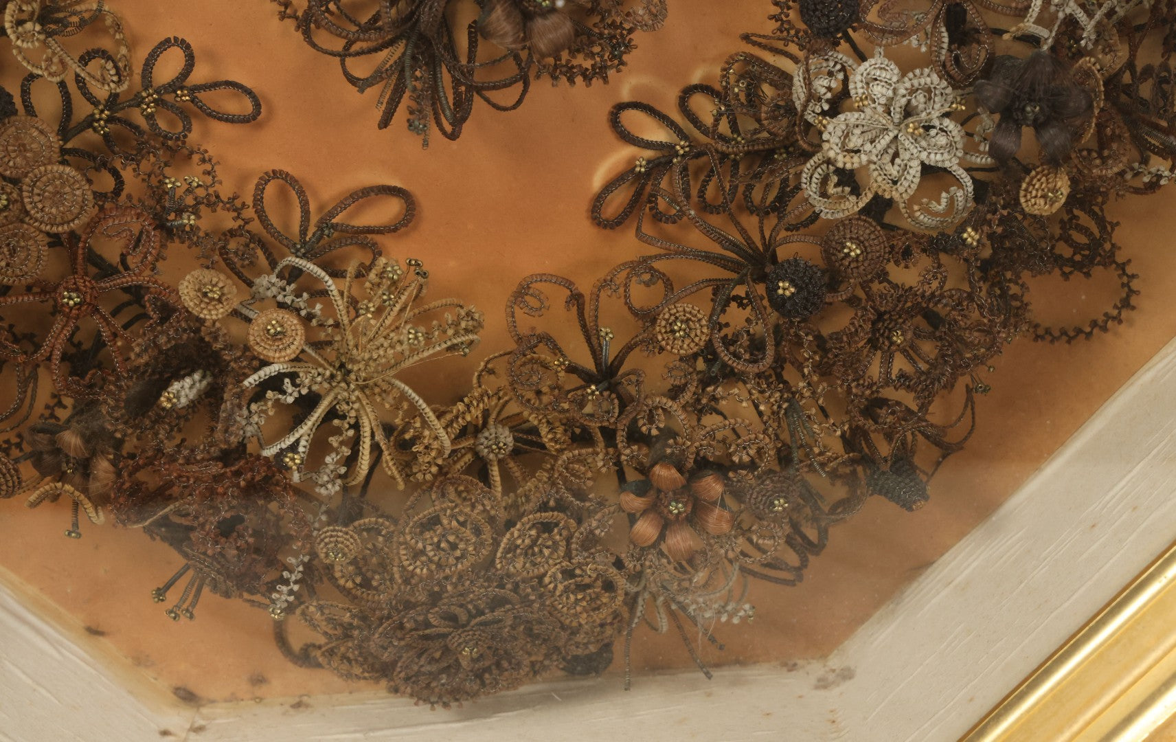 Lot 001 - Antique Victorian Human Hair Work Wreath In Octagon Shadow Box With Paper Label From J.D. Powers' Photograph Rooms, Springfield, Vermont, 20" x 20" x 6"