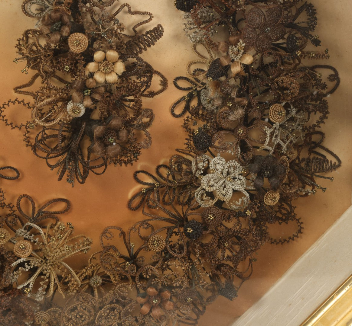 Lot 001 - Antique Victorian Human Hair Work Wreath In Octagon Shadow Box With Paper Label From J.D. Powers' Photograph Rooms, Springfield, Vermont, 20" x 20" x 6"