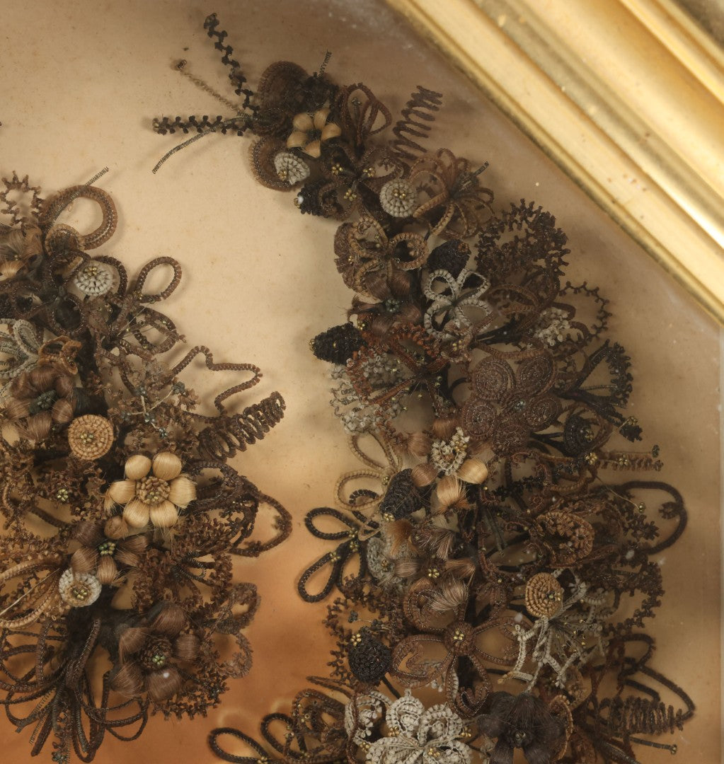 Lot 001 - Antique Victorian Human Hair Work Wreath In Octagon Shadow Box With Paper Label From J.D. Powers' Photograph Rooms, Springfield, Vermont, 20" x 20" x 6"