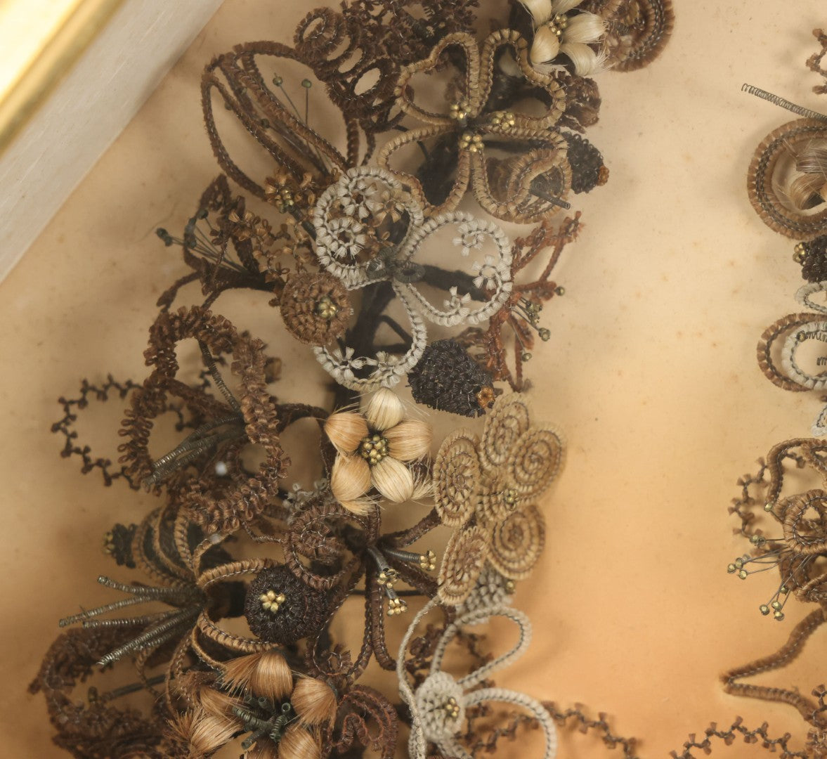 Lot 001 - Antique Victorian Human Hair Work Wreath In Octagon Shadow Box With Paper Label From J.D. Powers' Photograph Rooms, Springfield, Vermont, 20" x 20" x 6"