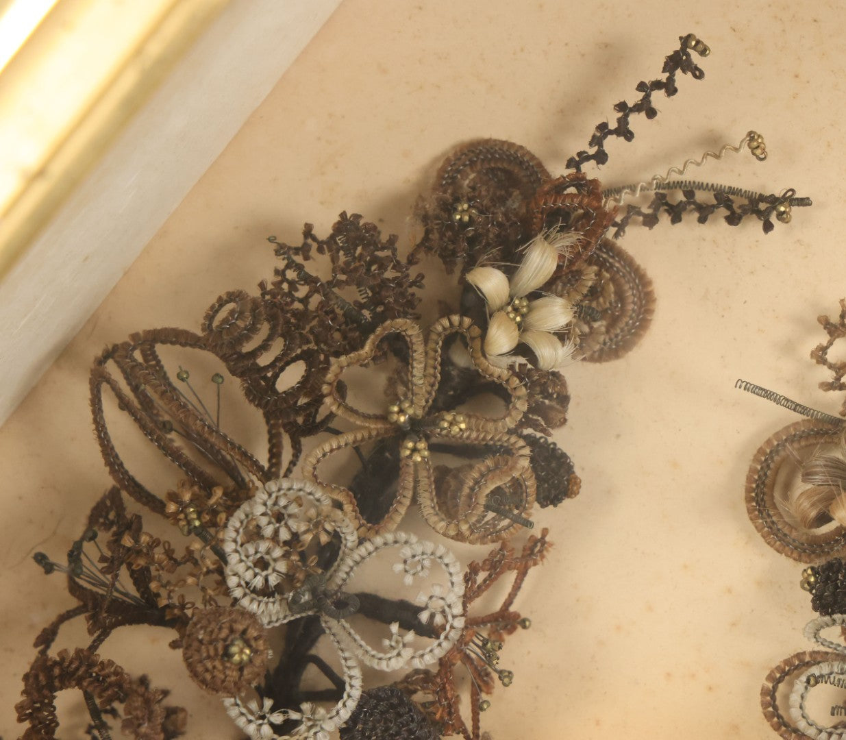 Lot 001 - Antique Victorian Human Hair Work Wreath In Octagon Shadow Box With Paper Label From J.D. Powers' Photograph Rooms, Springfield, Vermont, 20" x 20" x 6"