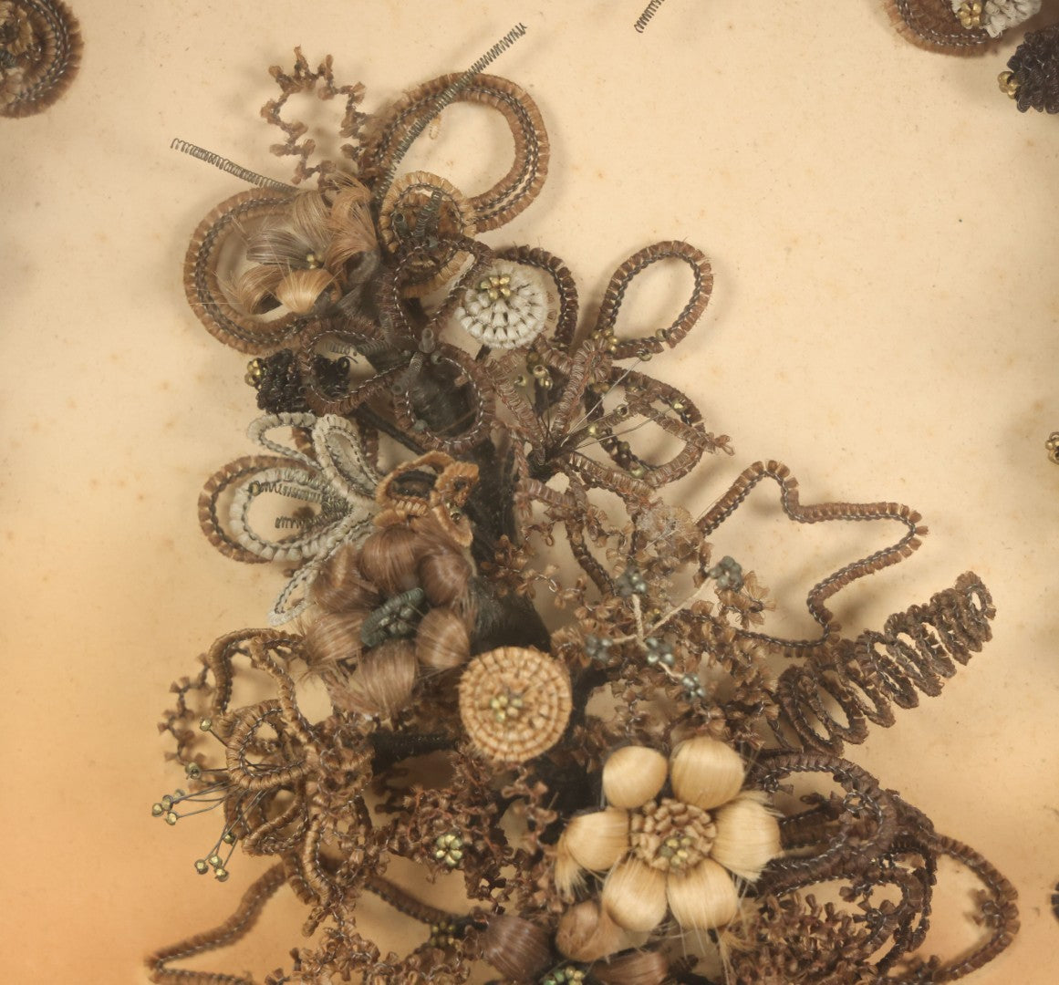 Lot 001 - Antique Victorian Human Hair Work Wreath In Octagon Shadow Box With Paper Label From J.D. Powers' Photograph Rooms, Springfield, Vermont, 20" x 20" x 6"