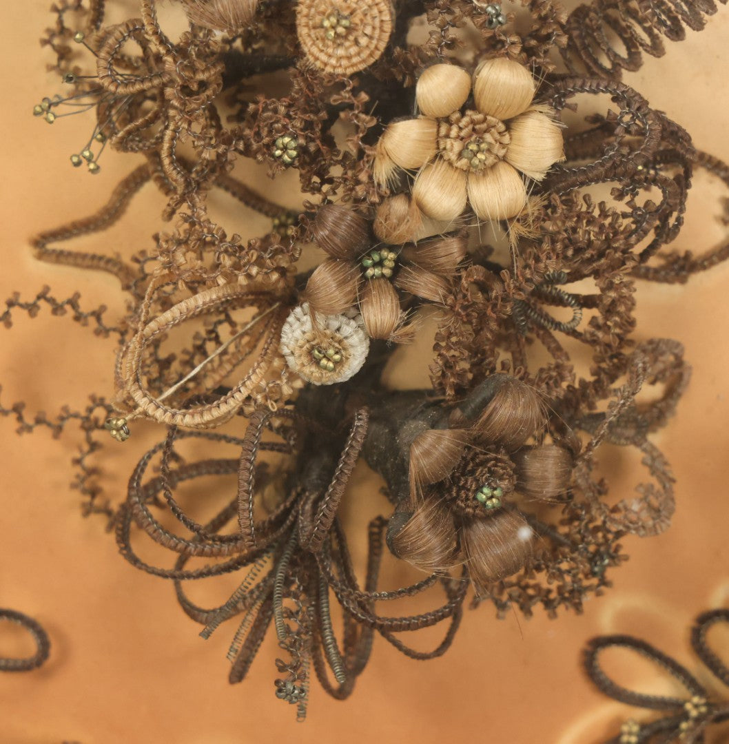 Lot 001 - Antique Victorian Human Hair Work Wreath In Octagon Shadow Box With Paper Label From J.D. Powers' Photograph Rooms, Springfield, Vermont, 20" x 20" x 6"