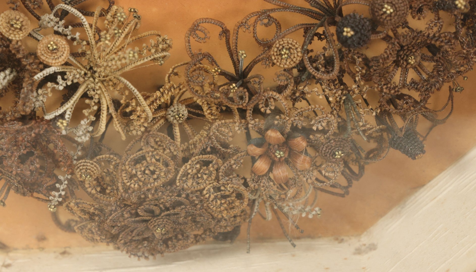 Lot 001 - Antique Victorian Human Hair Work Wreath In Octagon Shadow Box With Paper Label From J.D. Powers' Photograph Rooms, Springfield, Vermont, 20" x 20" x 6"