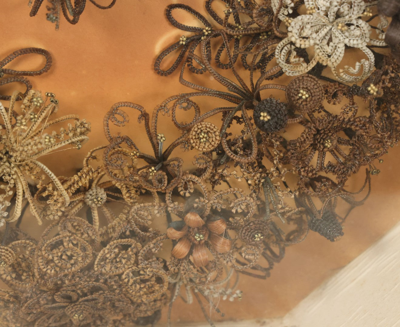 Lot 001 - Antique Victorian Human Hair Work Wreath In Octagon Shadow Box With Paper Label From J.D. Powers' Photograph Rooms, Springfield, Vermont, 20" x 20" x 6"