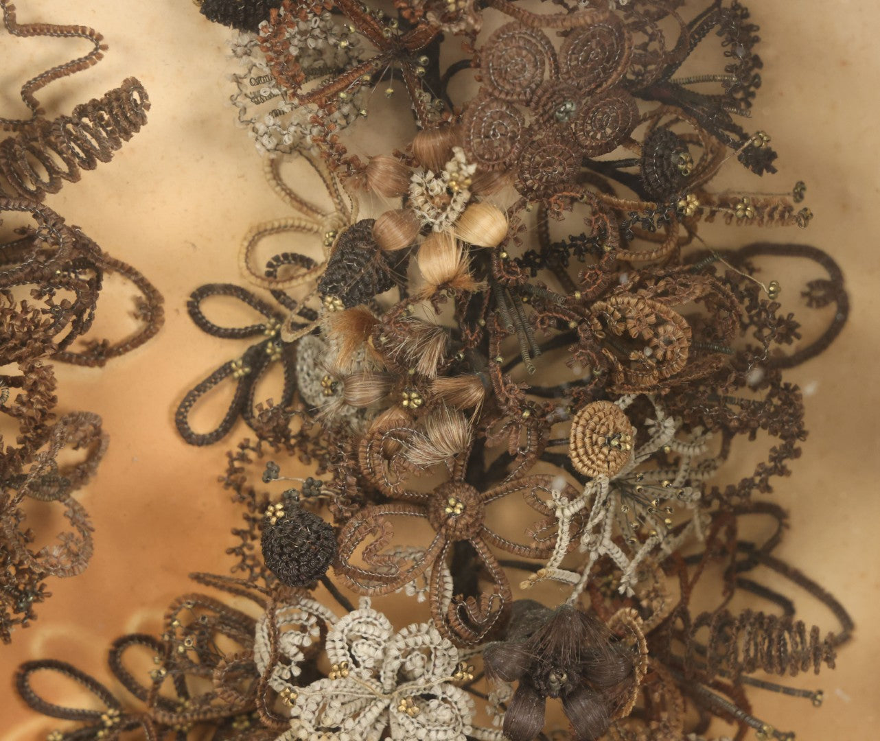 Lot 001 - Antique Victorian Human Hair Work Wreath In Octagon Shadow Box With Paper Label From J.D. Powers' Photograph Rooms, Springfield, Vermont, 20" x 20" x 6"
