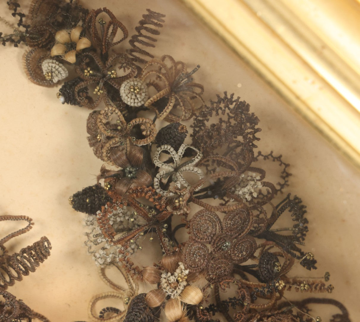 Lot 001 - Antique Victorian Human Hair Work Wreath In Octagon Shadow Box With Paper Label From J.D. Powers' Photograph Rooms, Springfield, Vermont, 20" x 20" x 6"