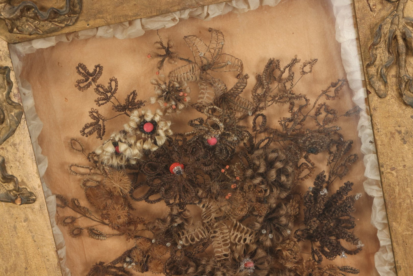 Lot 002 - Antique Victorian Human Hair Work Shadowbox In Ornate Gesso Frame With Bow Designs, Ruffled Surround, Many Beaded Embellishments, 14-5/8" x 20-1/2" x 2-1/2"