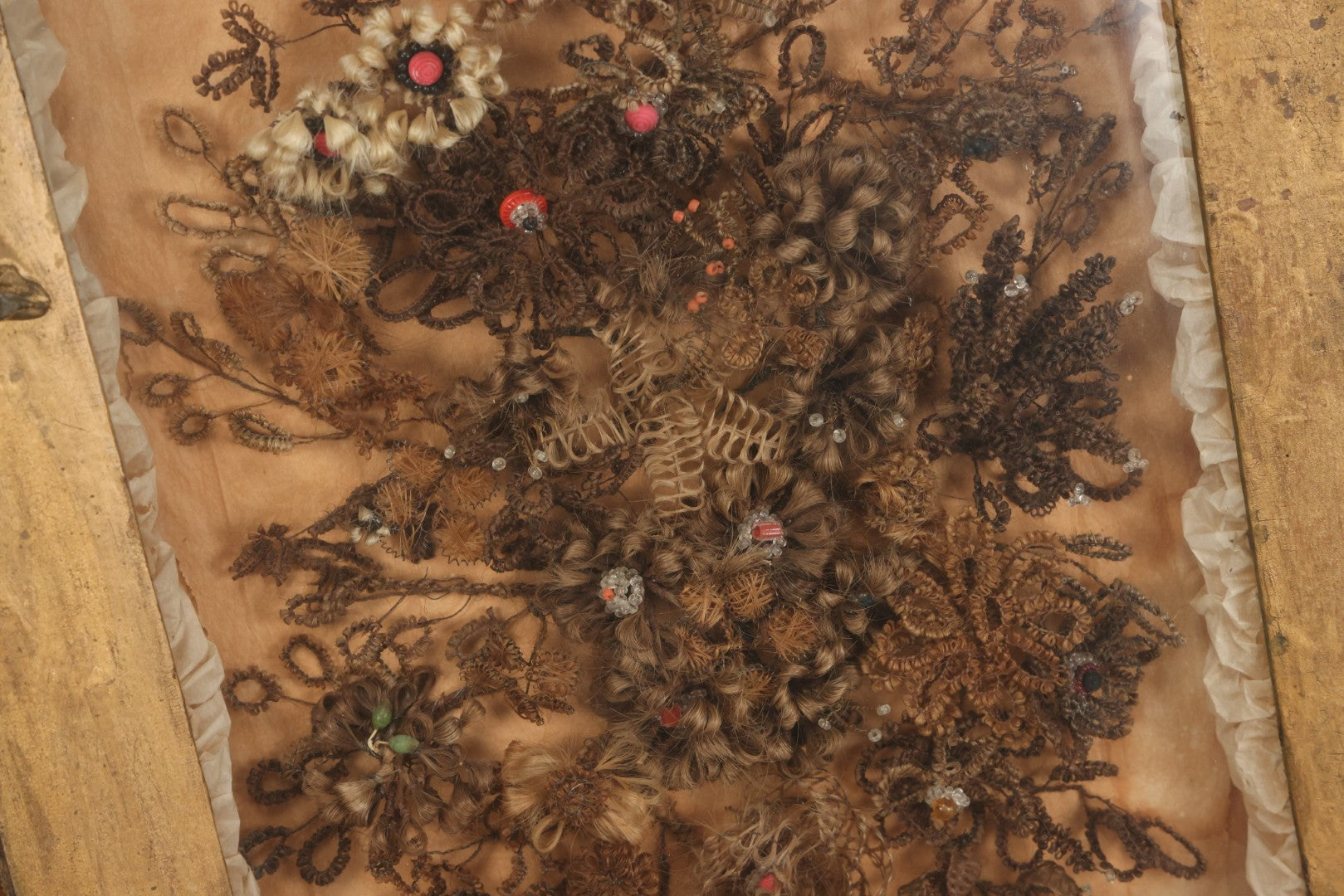 Lot 002 - Antique Victorian Human Hair Work Shadowbox In Ornate Gesso Frame With Bow Designs, Ruffled Surround, Many Beaded Embellishments, 14-5/8" x 20-1/2" x 2-1/2"