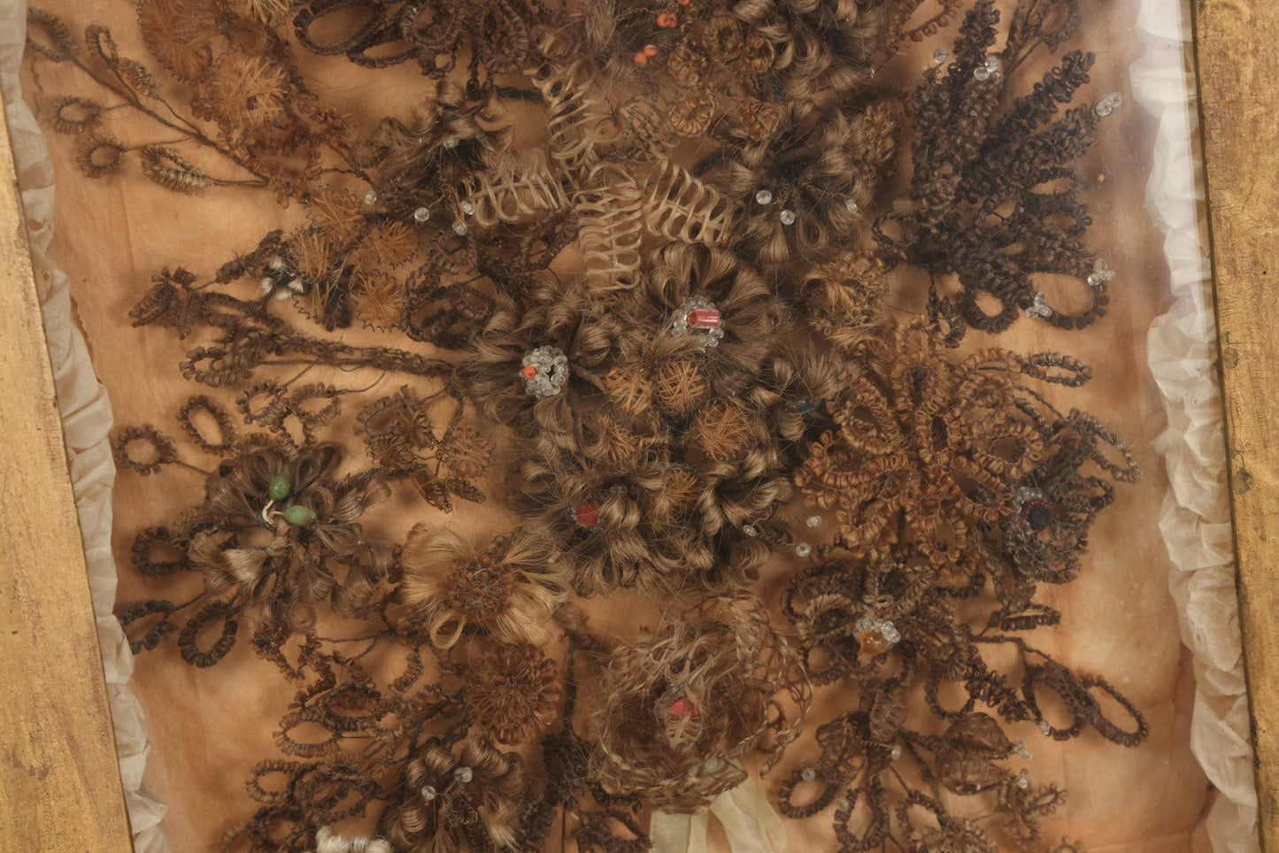 Lot 002 - Antique Victorian Human Hair Work Shadowbox In Ornate Gesso Frame With Bow Designs, Ruffled Surround, Many Beaded Embellishments, 14-5/8" x 20-1/2" x 2-1/2"