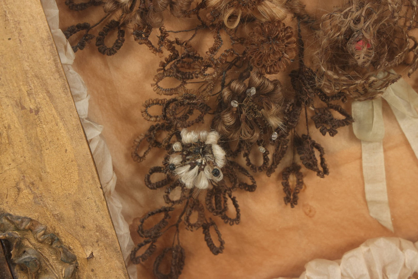 Lot 002 - Antique Victorian Human Hair Work Shadowbox In Ornate Gesso Frame With Bow Designs, Ruffled Surround, Many Beaded Embellishments, 14-5/8" x 20-1/2" x 2-1/2"