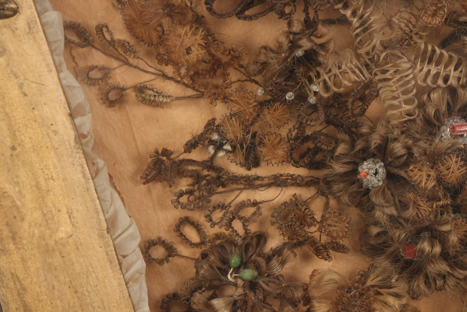 Lot 002 - Antique Victorian Human Hair Work Shadowbox In Ornate Gesso Frame With Bow Designs, Ruffled Surround, Many Beaded Embellishments, 14-5/8" x 20-1/2" x 2-1/2"