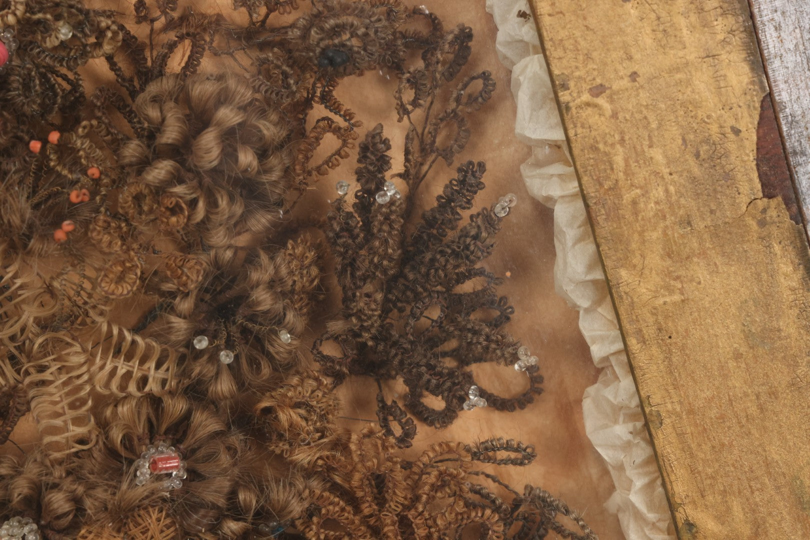 Lot 002 - Antique Victorian Human Hair Work Shadowbox In Ornate Gesso Frame With Bow Designs, Ruffled Surround, Many Beaded Embellishments, 14-5/8" x 20-1/2" x 2-1/2"