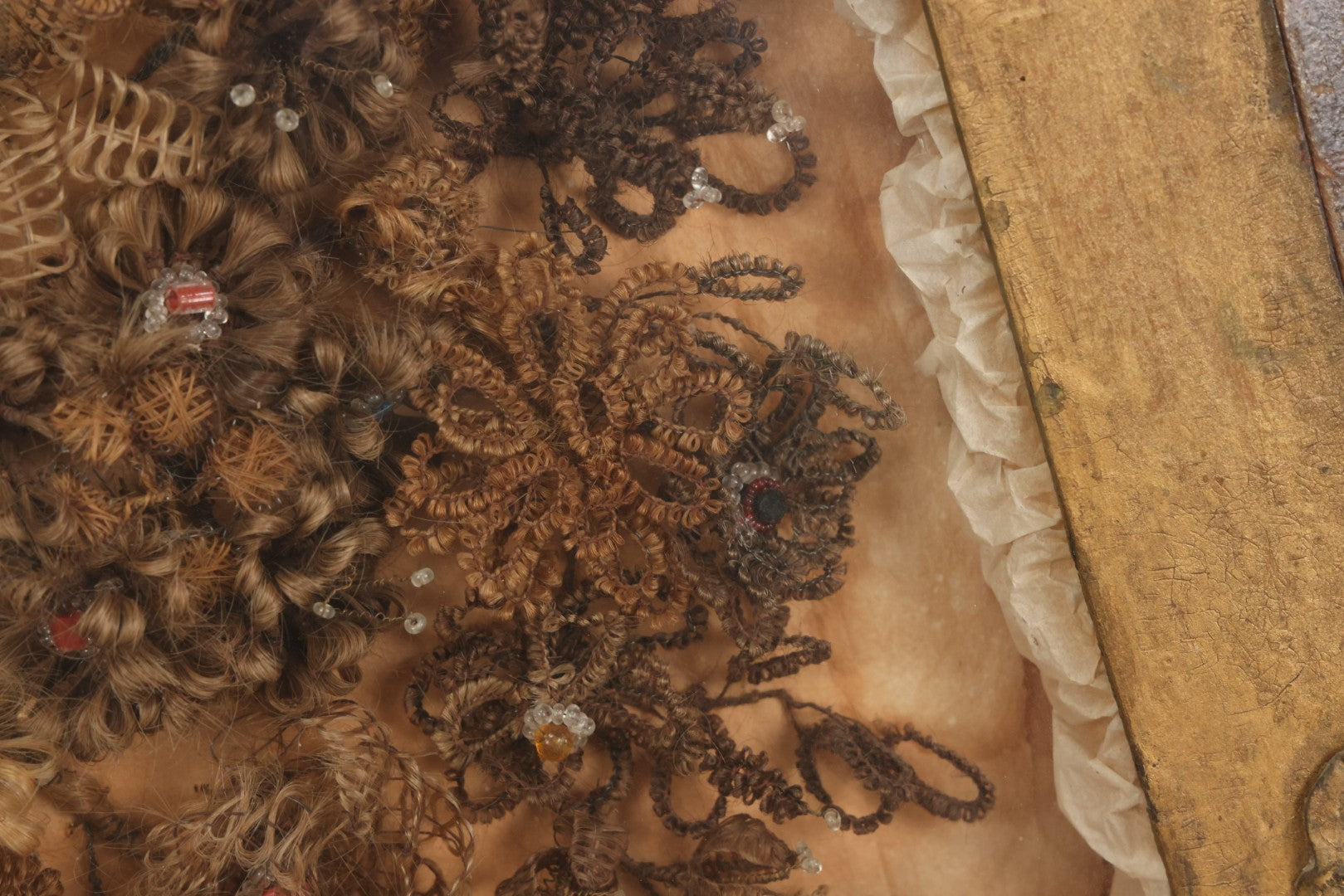 Lot 002 - Antique Victorian Human Hair Work Shadowbox In Ornate Gesso Frame With Bow Designs, Ruffled Surround, Many Beaded Embellishments, 14-5/8" x 20-1/2" x 2-1/2"