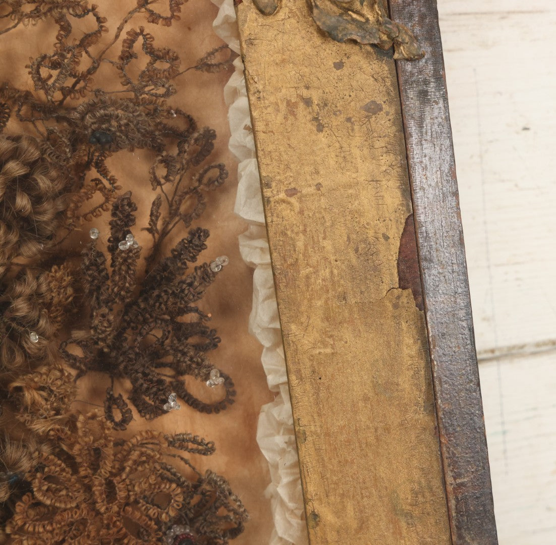 Lot 002 - Antique Victorian Human Hair Work Shadowbox In Ornate Gesso Frame With Bow Designs, Ruffled Surround, Many Beaded Embellishments, 14-5/8" x 20-1/2" x 2-1/2"