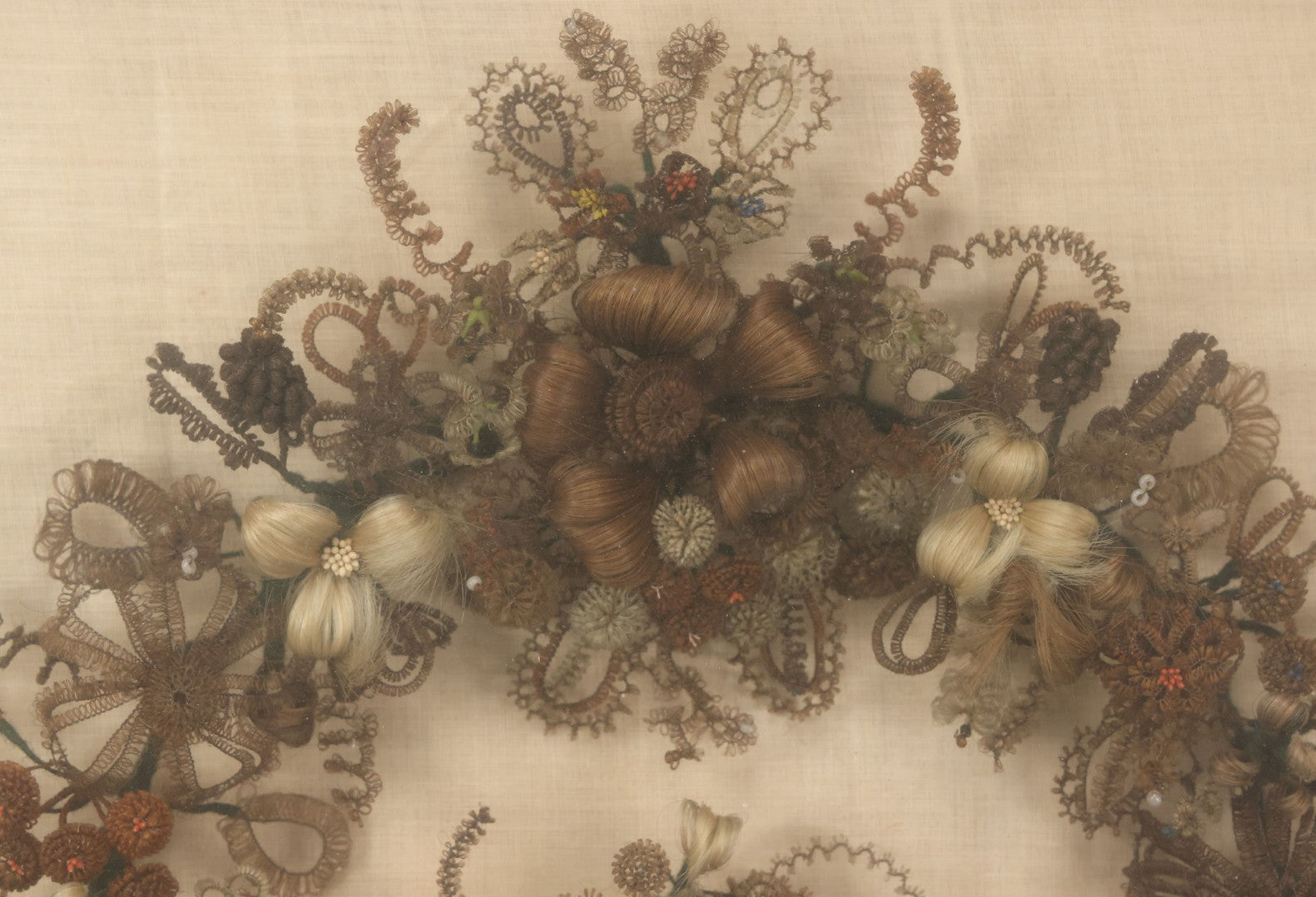Lot 004 - Antique Victorian Human Hair Work Circular Wreath In Rectangular Shadow Box With Hair Flowers At Center, Fabric Backing, 23-1/8" x 25" x 4-1/2"