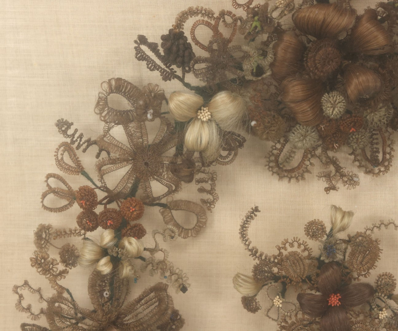 Lot 004 - Antique Victorian Human Hair Work Circular Wreath In Rectangular Shadow Box With Hair Flowers At Center, Fabric Backing, 23-1/8" x 25" x 4-1/2"