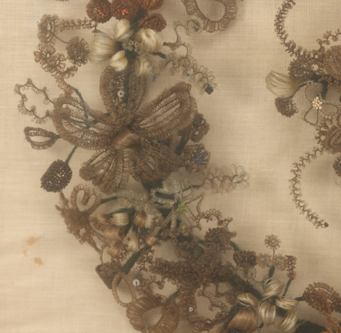 Lot 004 - Antique Victorian Human Hair Work Circular Wreath In Rectangular Shadow Box With Hair Flowers At Center, Fabric Backing, 23-1/8" x 25" x 4-1/2"