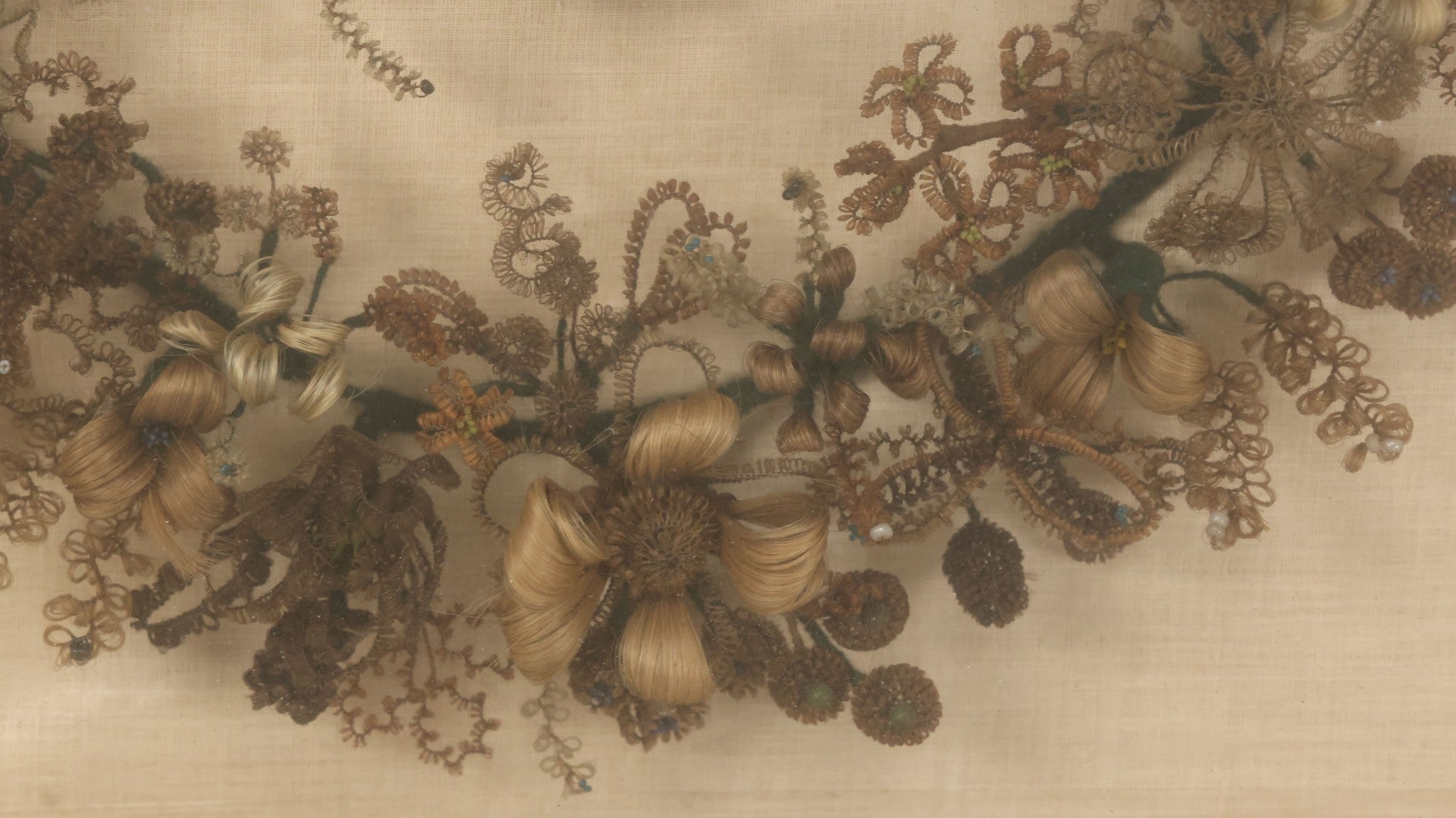 Lot 004 - Antique Victorian Human Hair Work Circular Wreath In Rectangular Shadow Box With Hair Flowers At Center, Fabric Backing, 23-1/8" x 25" x 4-1/2"