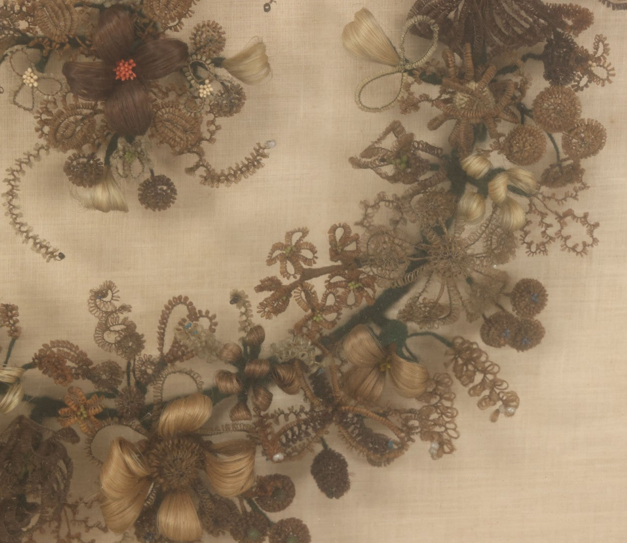 Lot 004 - Antique Victorian Human Hair Work Circular Wreath In Rectangular Shadow Box With Hair Flowers At Center, Fabric Backing, 23-1/8" x 25" x 4-1/2"