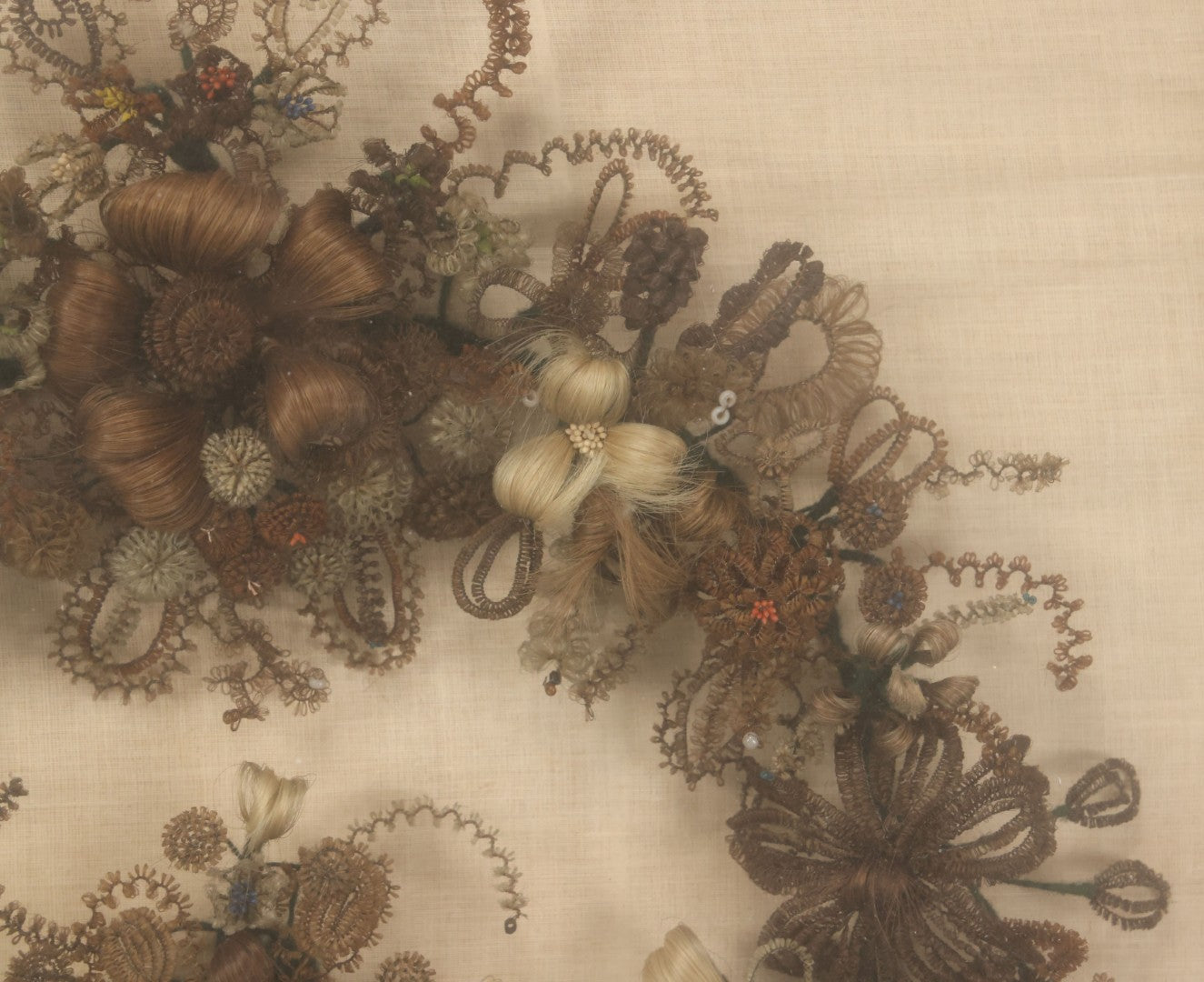 Lot 004 - Antique Victorian Human Hair Work Circular Wreath In Rectangular Shadow Box With Hair Flowers At Center, Fabric Backing, 23-1/8" x 25" x 4-1/2"
