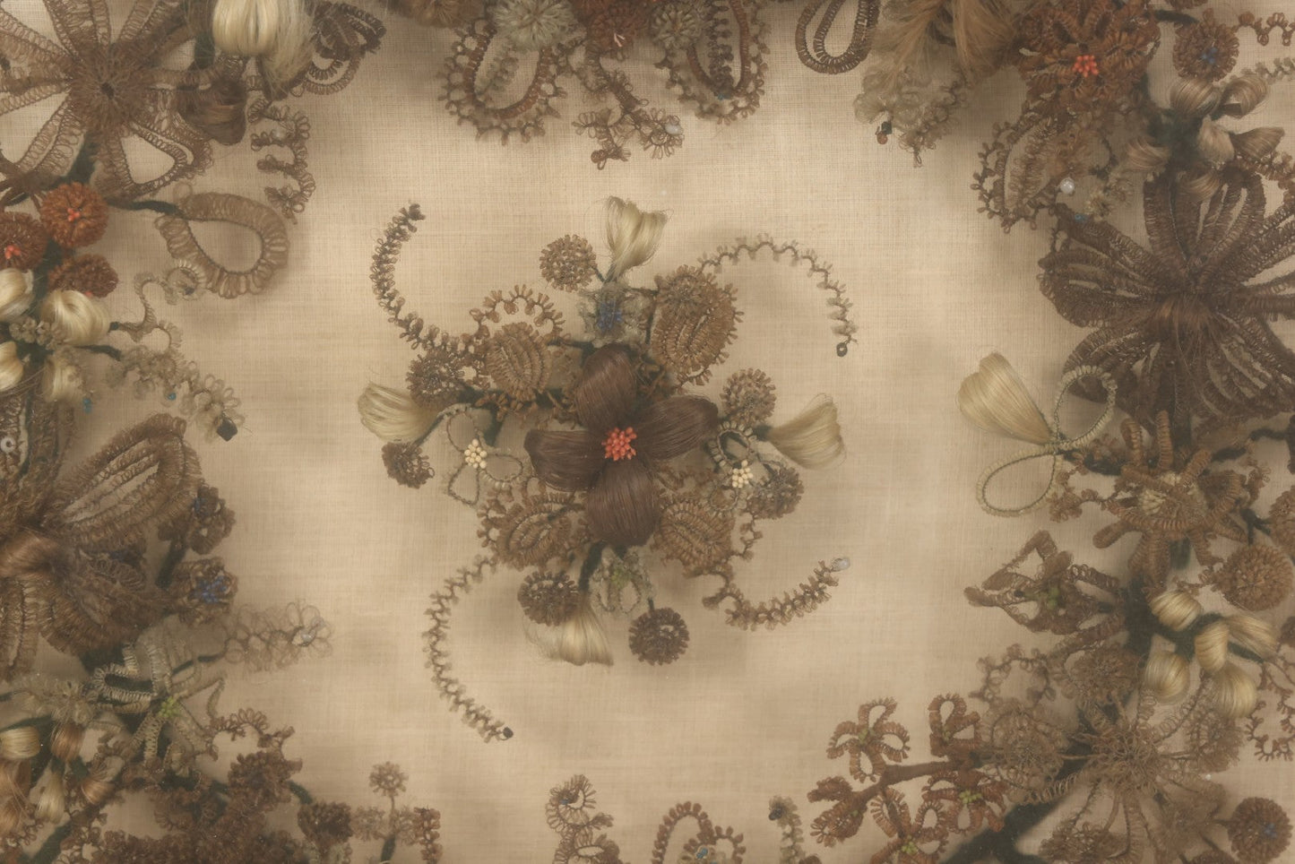 Lot 004 - Antique Victorian Human Hair Work Circular Wreath In Rectangular Shadow Box With Hair Flowers At Center, Fabric Backing, 23-1/8" x 25" x 4-1/2"