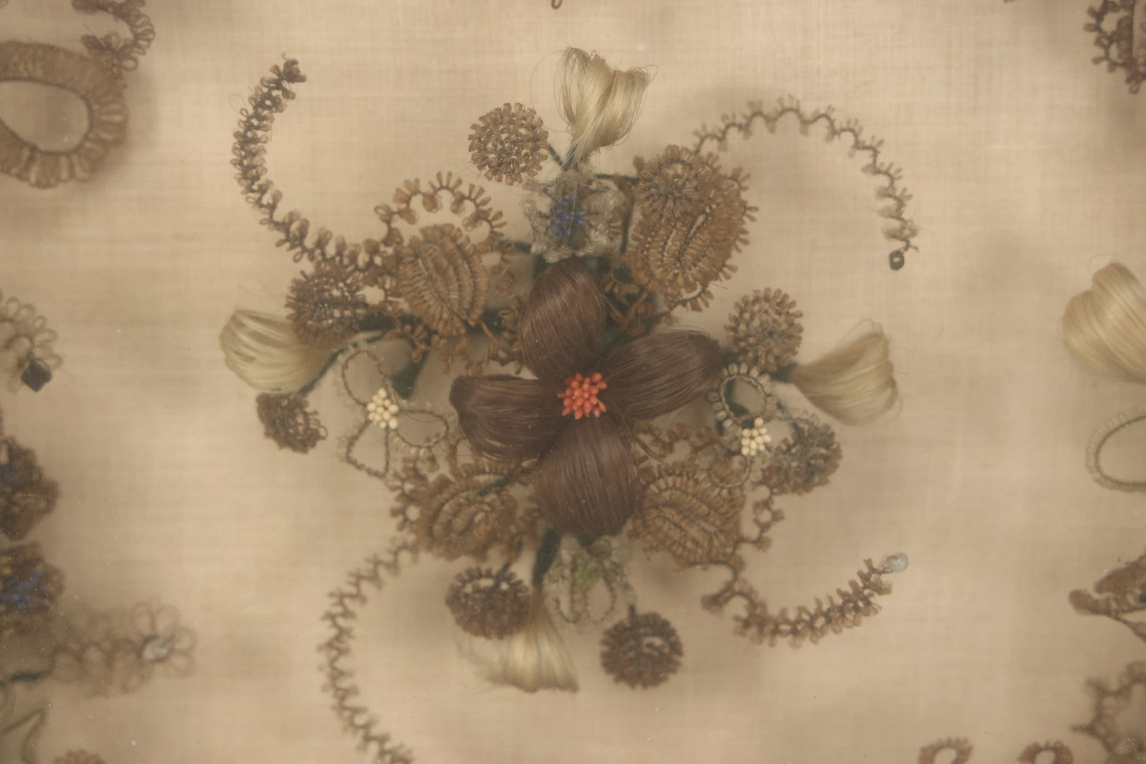 Lot 004 - Antique Victorian Human Hair Work Circular Wreath In Rectangular Shadow Box With Hair Flowers At Center, Fabric Backing, 23-1/8" x 25" x 4-1/2"