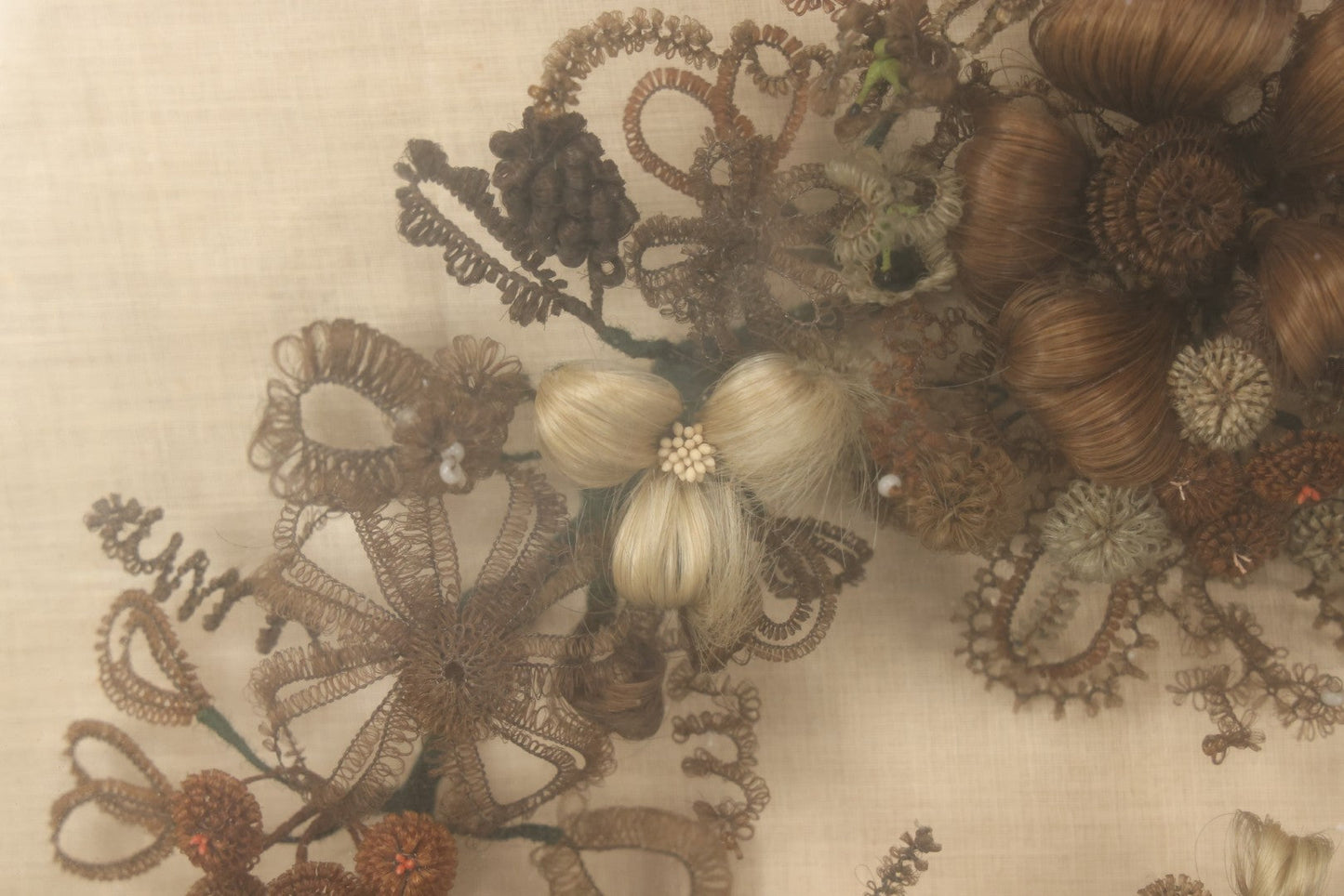 Lot 004 - Antique Victorian Human Hair Work Circular Wreath In Rectangular Shadow Box With Hair Flowers At Center, Fabric Backing, 23-1/8" x 25" x 4-1/2"