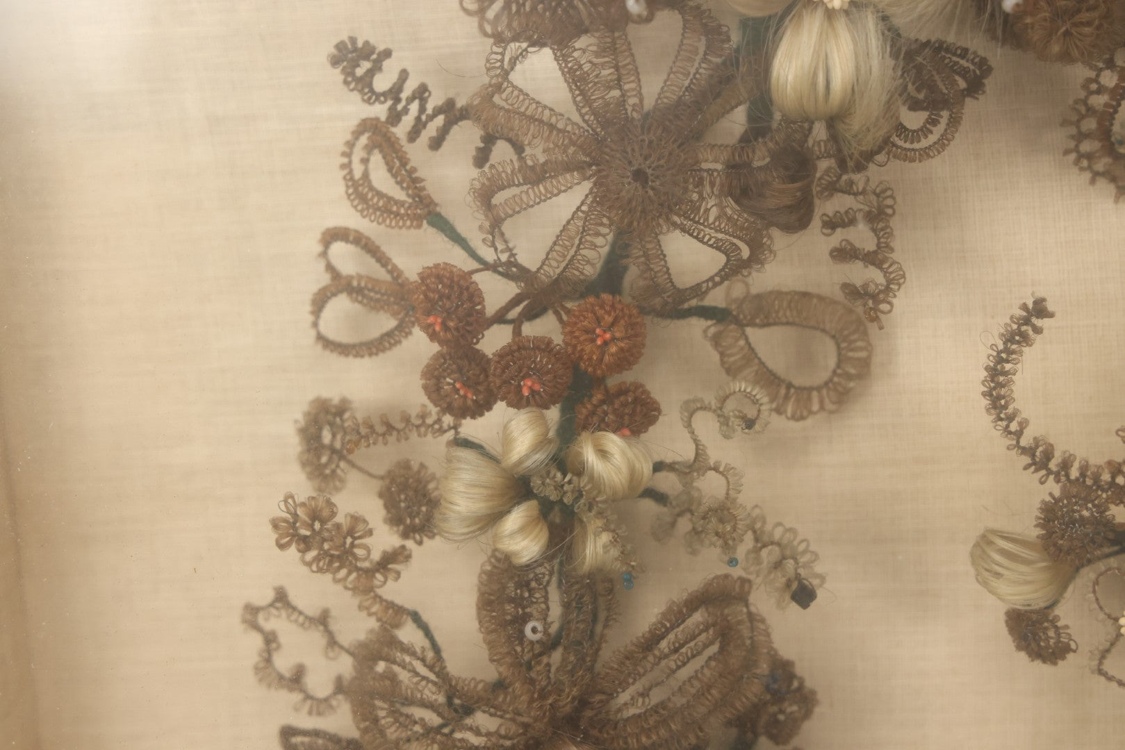 Lot 004 - Antique Victorian Human Hair Work Circular Wreath In Rectangular Shadow Box With Hair Flowers At Center, Fabric Backing, 23-1/8" x 25" x 4-1/2"