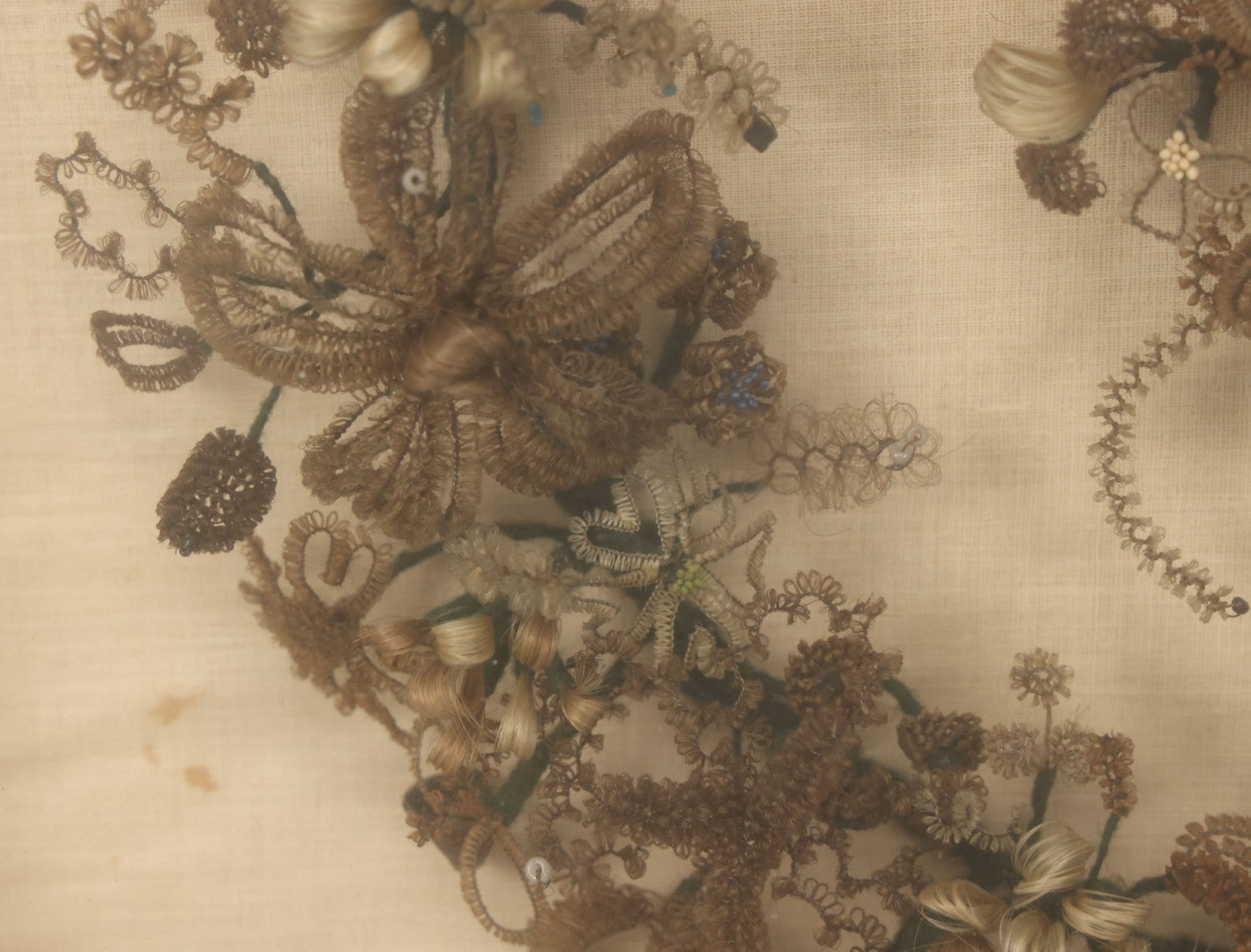 Lot 004 - Antique Victorian Human Hair Work Circular Wreath In Rectangular Shadow Box With Hair Flowers At Center, Fabric Backing, 23-1/8" x 25" x 4-1/2"