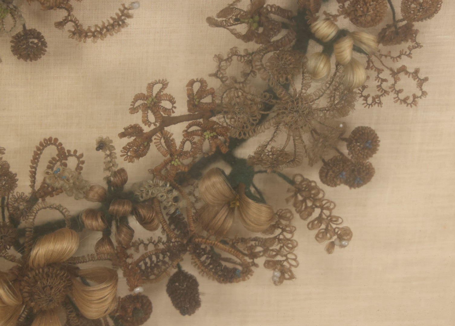 Lot 004 - Antique Victorian Human Hair Work Circular Wreath In Rectangular Shadow Box With Hair Flowers At Center, Fabric Backing, 23-1/8" x 25" x 4-1/2"